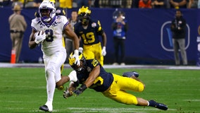 TCU upsets Michigan 51-45 to advance to the College Football Playoff championship