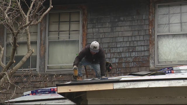 Single mother gets new roof thanks to Rehab Highland Park, donors, businesses