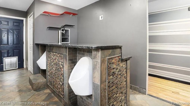 Ferndale home with urinals in kitchen, Jager tap in shower hits market