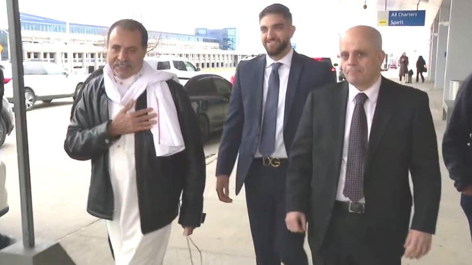 Mohammed Salem, left, arriving at Detroit Metropolitan Airport back from Saudi Arabia.