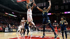 Young sparks Maryland late, knocks off Michigan, 64-58