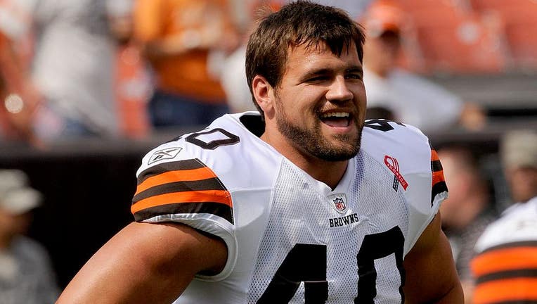 Battered Peyton Hillis takes shot to back and ribs, held to 35