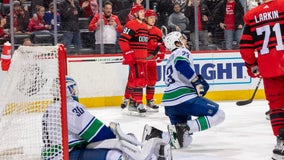 Larkin, Berggren score 2 goals apiece, Wings down Canucks