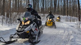 Free snowmobiling weekend lets Michiganders hit the trails across state