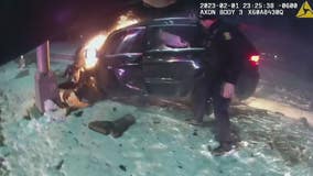 Video: Wyandotte police make life-saving rescue after fiery crash by suspect