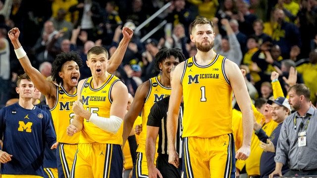 Bufkin, Dickinson lead Michigan past Wisconsin 87-79 in OT