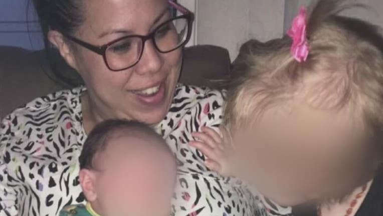 Lynn Kim and two of her children.
