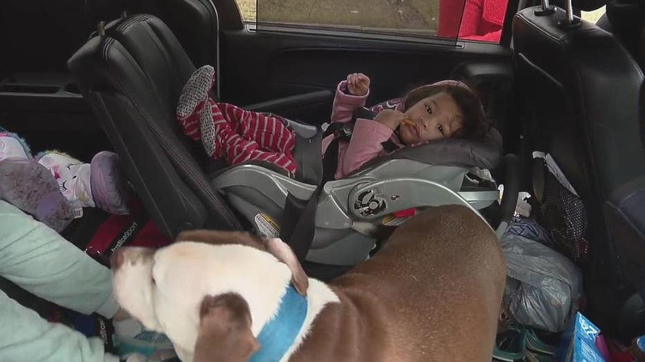 One-year-old Chantal and family dog Blue, who led firefighters upstairs to her amid the house fire.