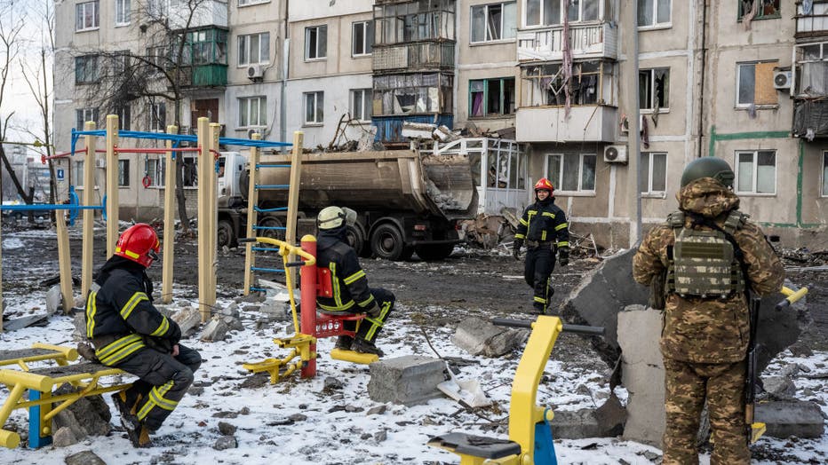 Ukrainian Emergency Workers Make Safe Building Hit By Russian Missile