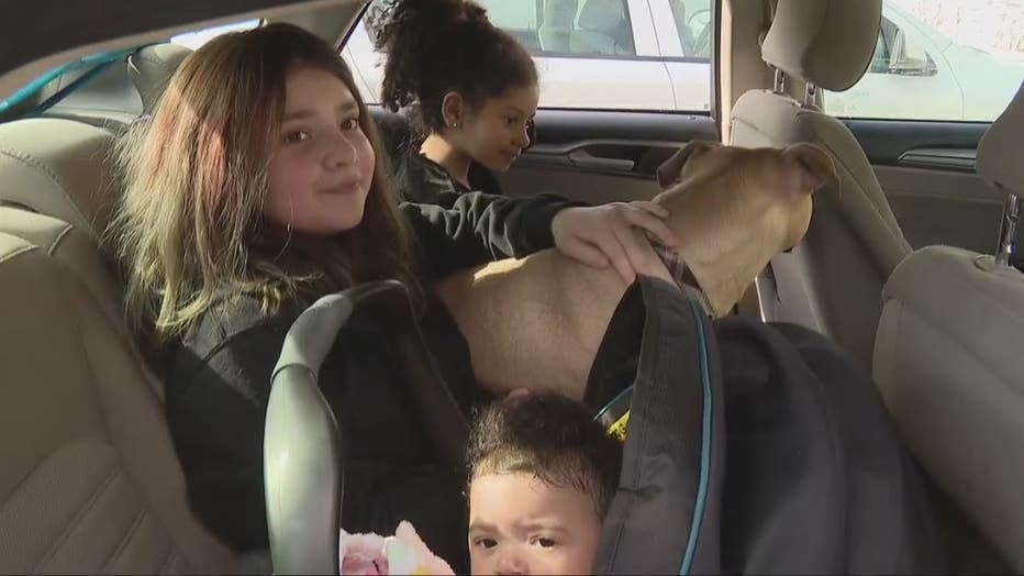 The family of 5 is living out of a Ford Fusion after the house fire.