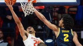 Illinois holds off Michigan 91-87 in double overtime