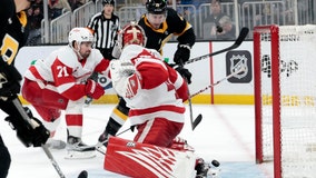 Bruins beat Red Wings 3-2, set record for fastest to 50 wins