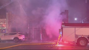 Crews battle fire at Grosse Pointe Park roofing business, save bar next door