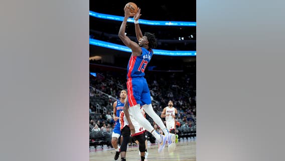 Herro's late run helps Heat come back to beat Pistons