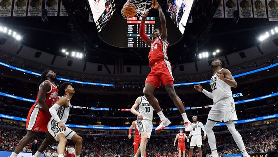 No. 13 seed Ohio St. reaches semis, 68-58 over Spartans