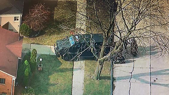 Barricaded gunman under arrest by Warren police after surrender