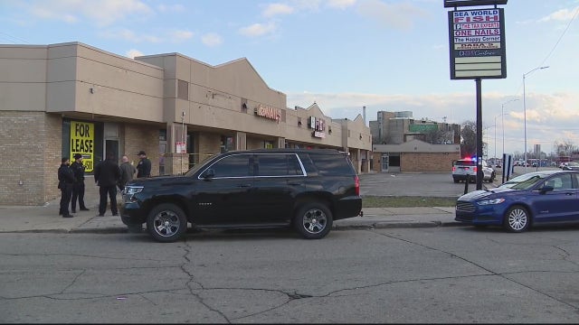 9-year-old boy, woman shot at Detroit strip mall