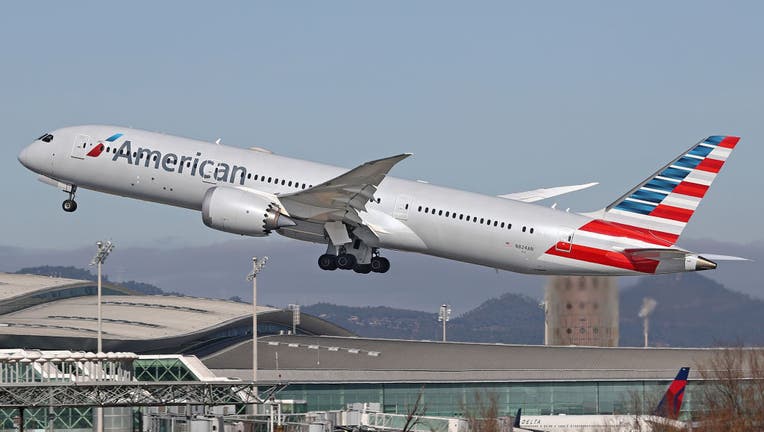 3717e596-American Boeing 787-9 Dreamliner taking off