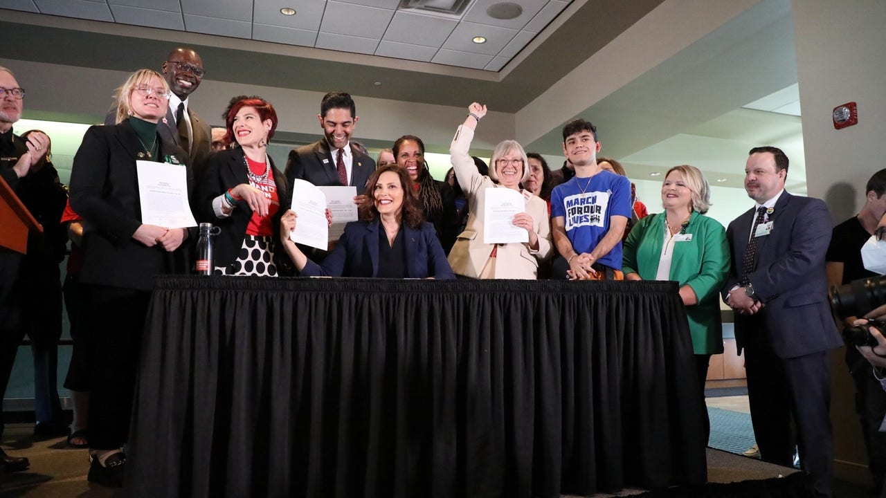 Whitmer Signs Safe Storage And Background Check Gun Bills Into Law ...