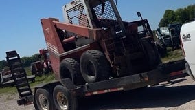 Northern Michigan police searching for skid steer loader, trailer stolen last summer