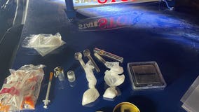 Pipes, loaded syringes, and 33 grams of meth seized from Michigan woman's car