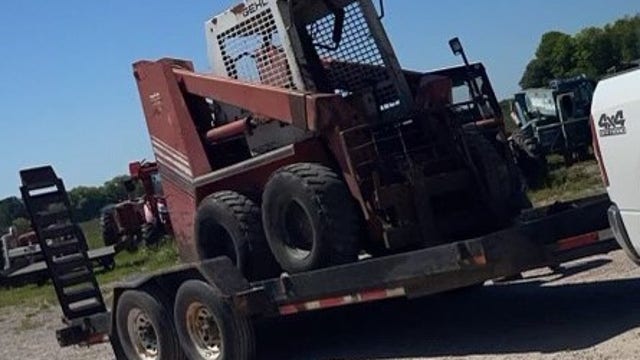 Northern Michigan police searching for skid steer loader, trailer stolen last summer