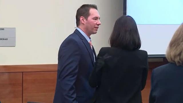 Doctor acquitted in 14 patient deaths sues health system in Detroit