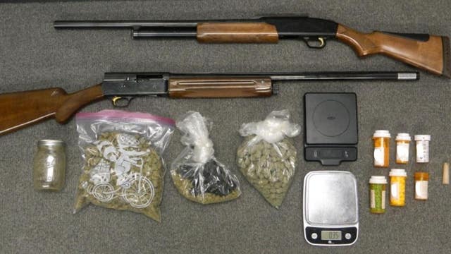 Berkley police seize guns, marijuana, pills after impaired woman runs red light