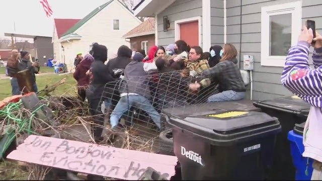 Protesters clash with bailiffs while trying to stop Detroit tiny home eviction