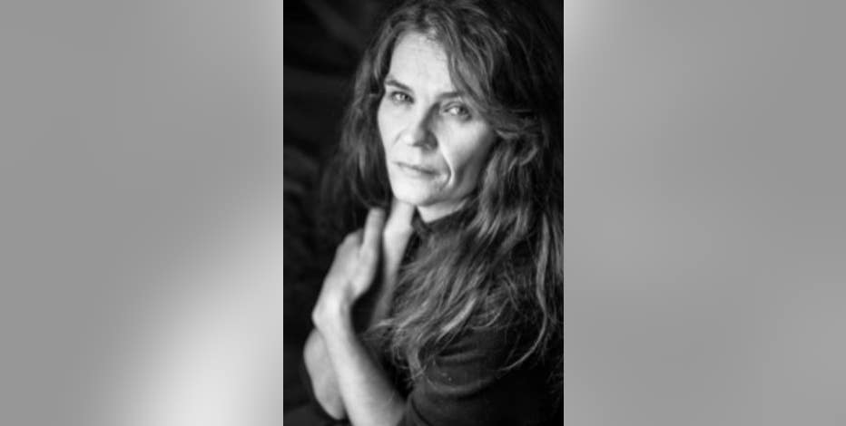 Convicted felon charged in murder of Ann Arbor community activist