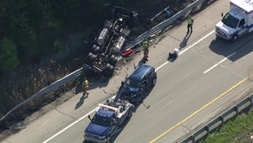 Semi hauling steel coils cut off on I-94, flips over