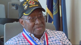 Warren honors 100-year-old veteran who helped break US military color barrier