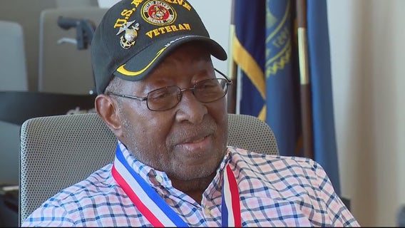 Warren honors 100-year-old veteran who helped break US military color barrier
