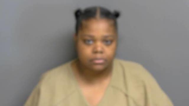 Fight over dogs leads to Macomb woman allegedly pointing gun at victim