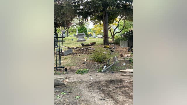 Carjacking suspect crashes through Dearborn cemetery during police chase