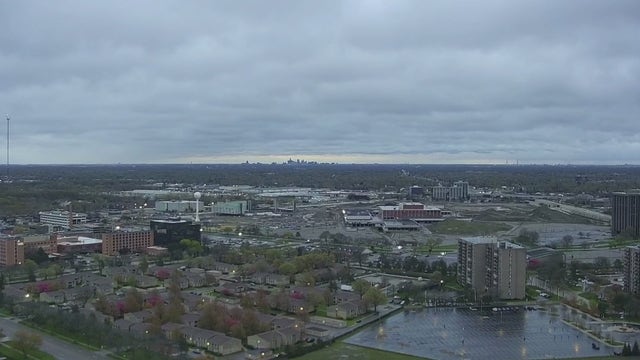 Occasional rain, clouds, and potential for snow flakes Tuesday