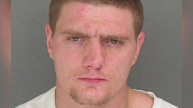 Stabbing suspect who killed woman putting air in tire, slit own wrist in police custody