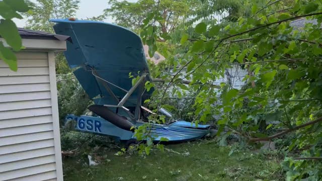 Small, single-engine plane crashes in backyard of Detroit home on east side