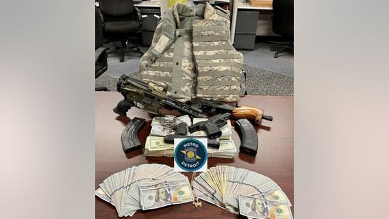 Driver caught with drugs also had body armor, guns, and stacks of cash