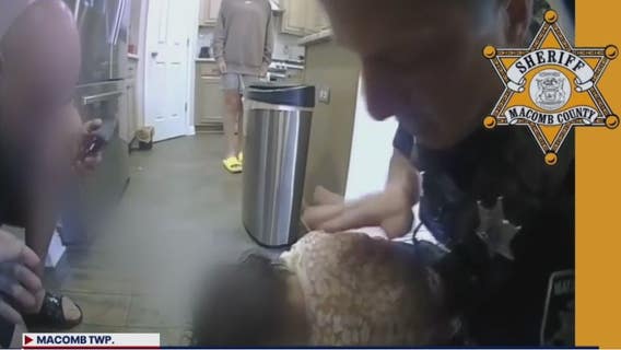 Macomb County deputies save 2-year-old found face-down in swimming pool