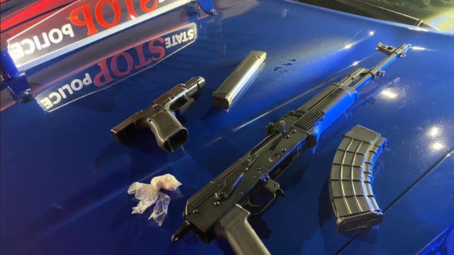 Drugs and loaded fully automatic AK-47 found during traffic stop for not wearing a seatbelt