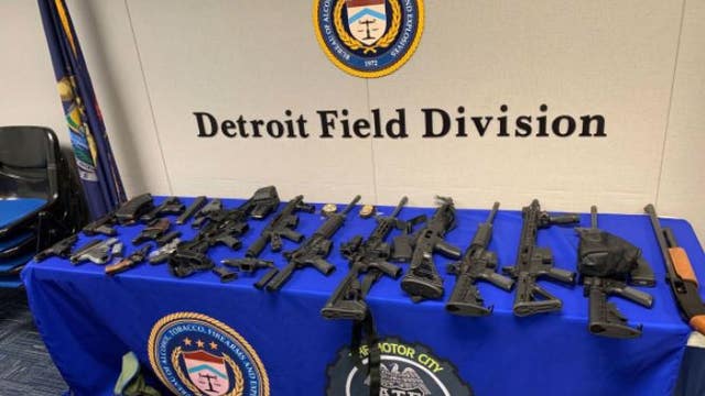 Investigators find fake fed badges, stolen guns after man allegedly shoots at wife in Detroit alley