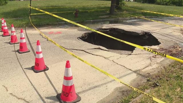 Massive sinkhole opens after water main break on Detroit's west side