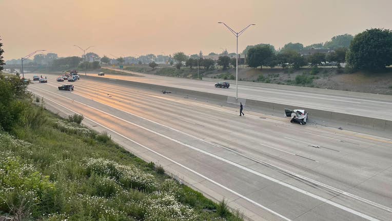 Challenger 'traveling over 100 MPH' hits car crash scene on I-696; car cut  in half