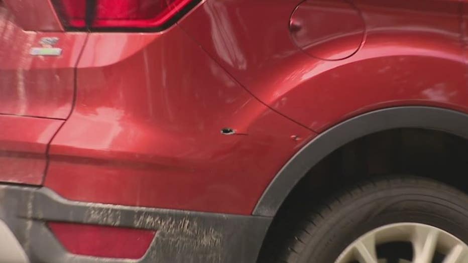 One of the two gunshots fired hit this Ford Escape in Troy.