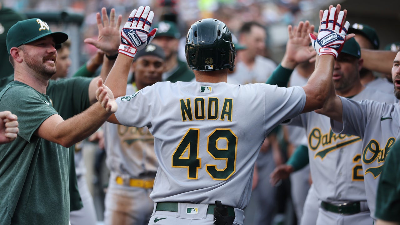 Ryan Noda of the Oakland Athletics high fives Shea Langeliers after News  Photo - Getty Images