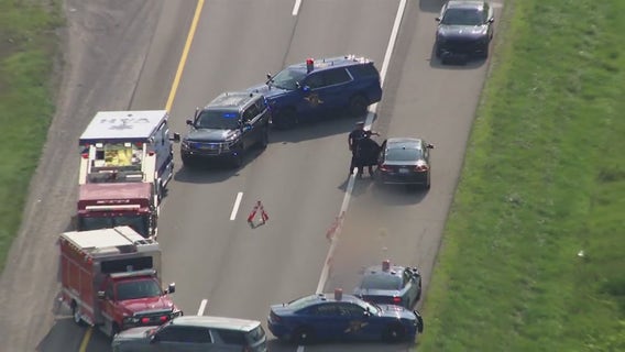 Victim found shot to death along M-14; police search for suspect