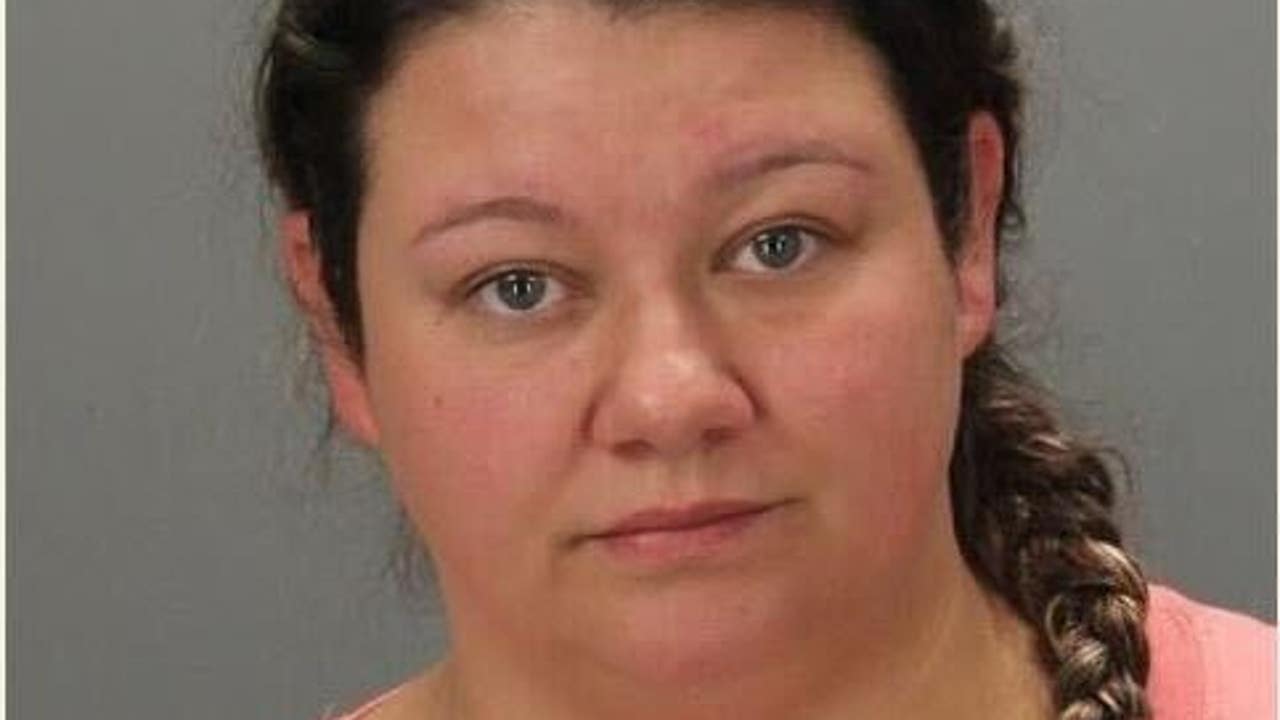 Taylor woman charged with performing sex acts on