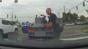 Watch: Warren police video captures moment baby is saved by officer
