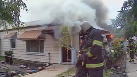 Dearborn Firefighters hailed as heroes for saving man in house fire